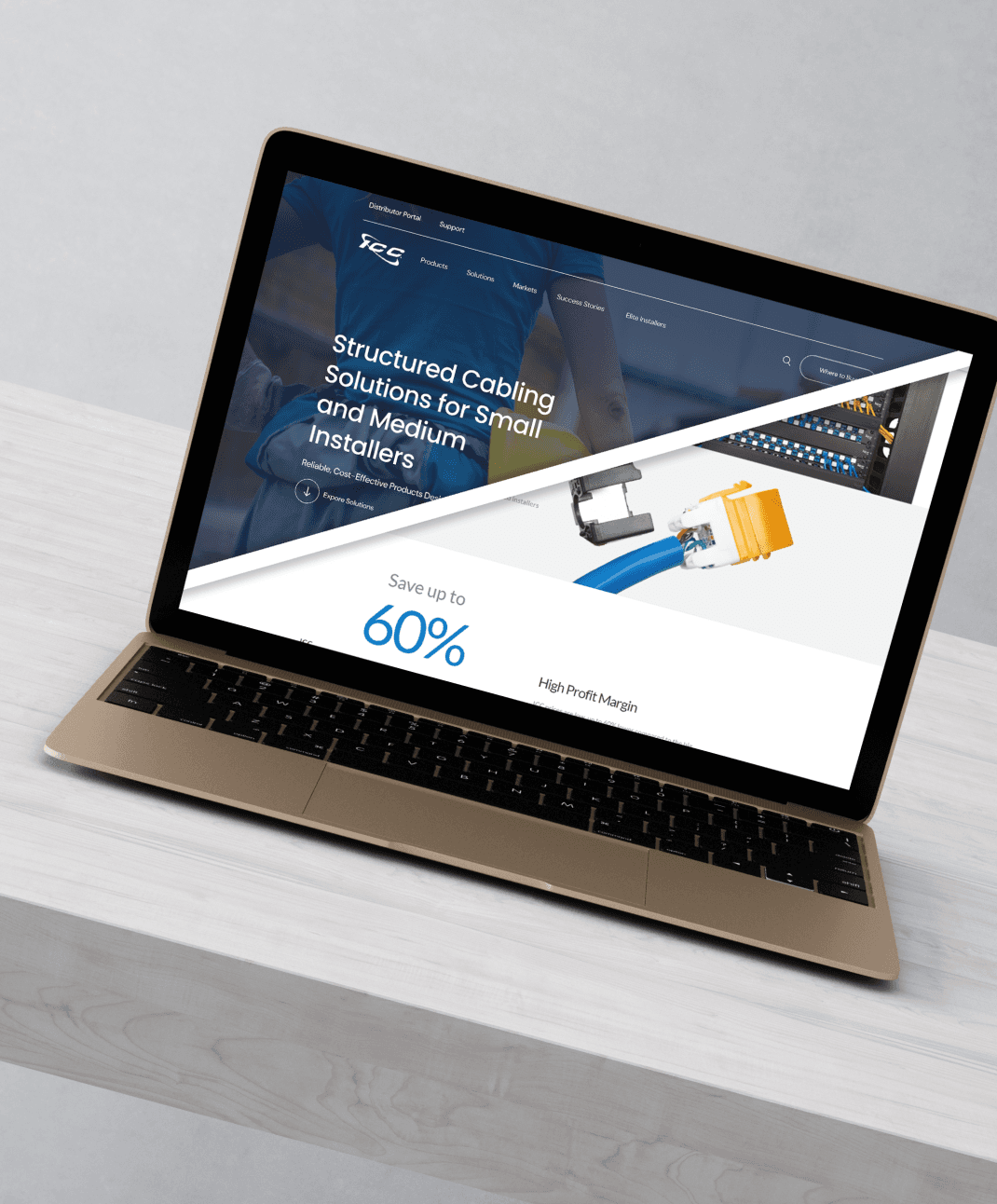 Laptop shows cabling site, product photos, discount offer.